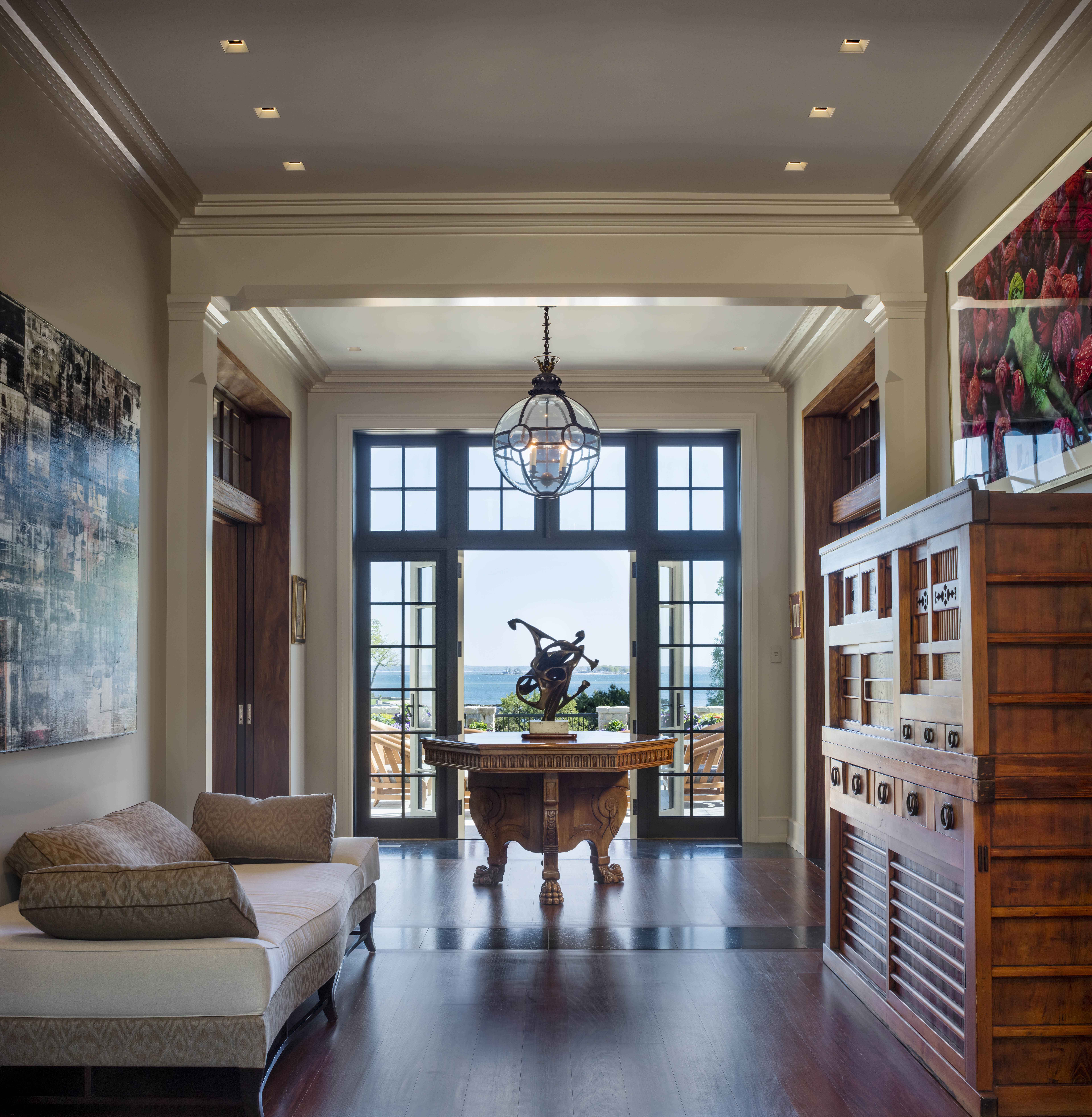 Front hall with axial view through the residence