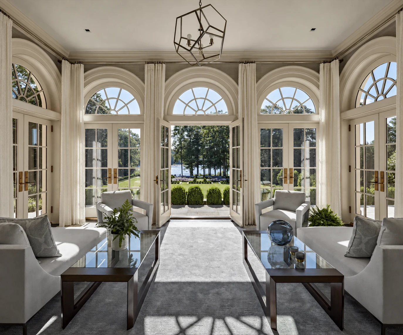 Mid Country Grandeur sunroom with arched windows in Fairfield County, Connecticut, built by Hobbs Inc.