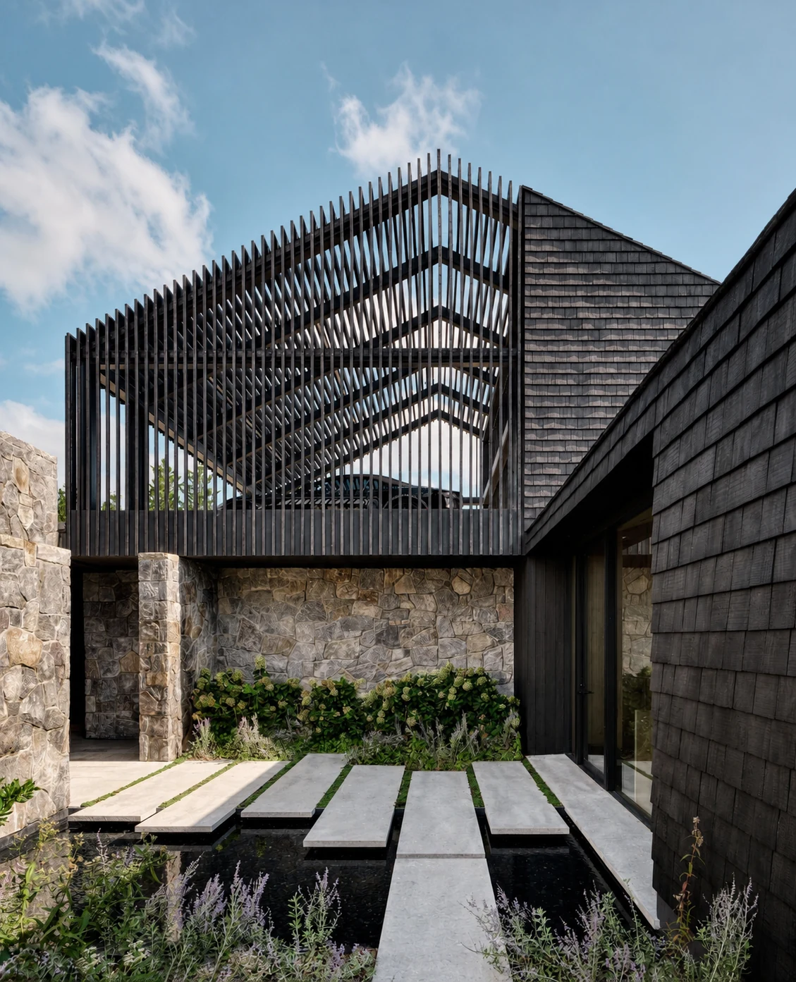 Montauk Cliff House black timber screen courtyard in Montauk, New York, built by Hobbs Inc.
