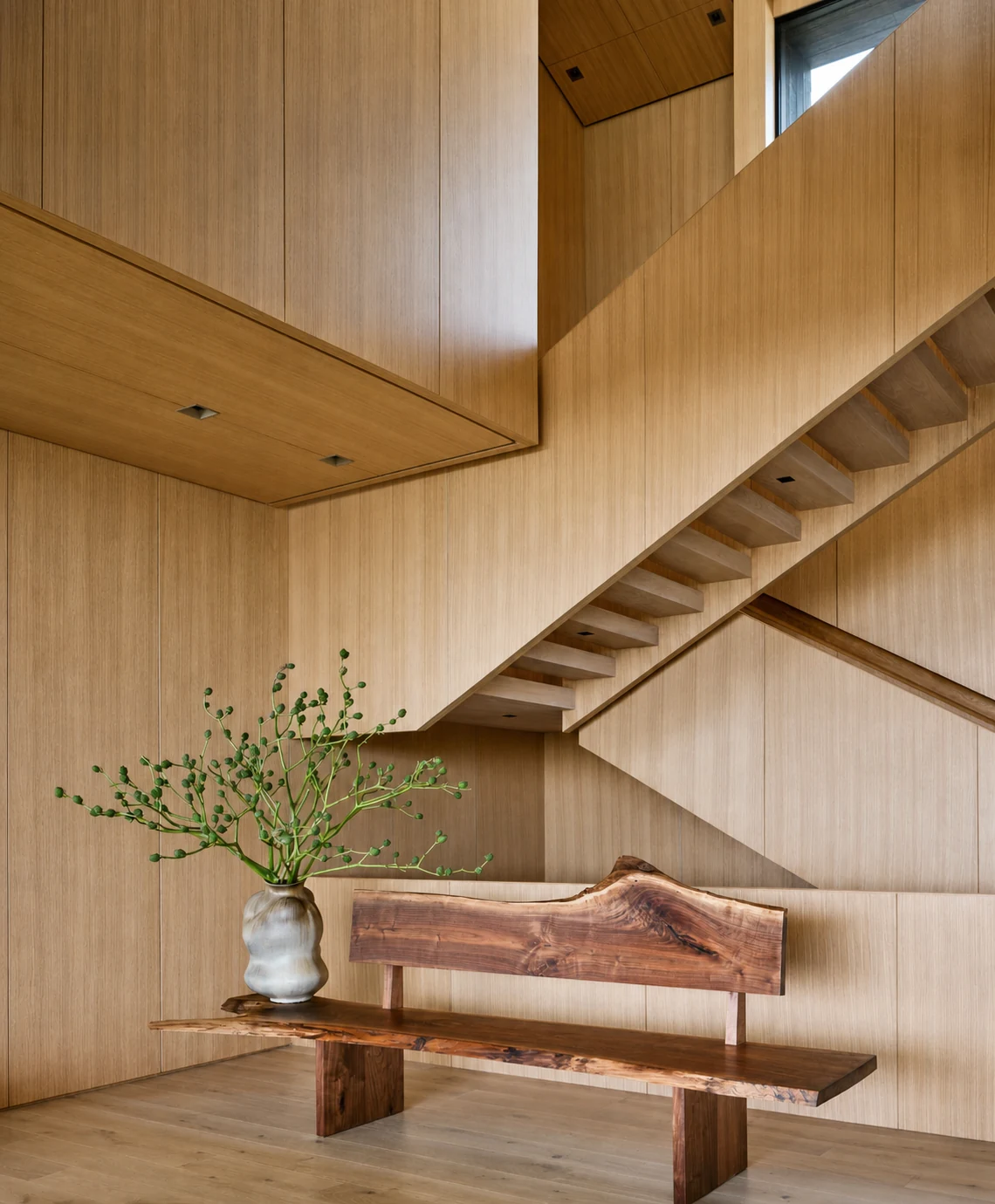 Montauk Cliff House wood staircase and sculptural bench in Montauk, New York, built by Hobbs Inc.