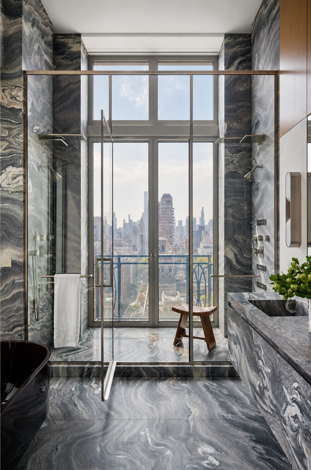 Upper East Side Penthouse Triplex marble bathroom with skyline view in Upper East Side, New York City, built by Hobbs Inc.